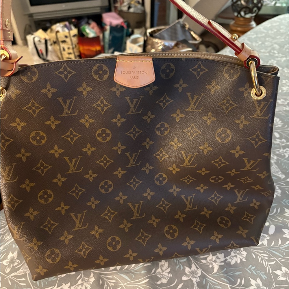 Monogram shoulder bag in excellent condition